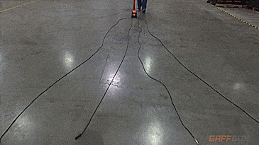 Gaff Gun Automatically Tapes Down Cords To Your Floor