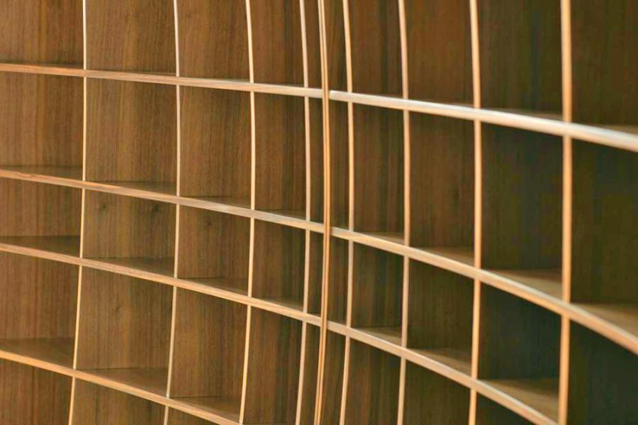 Concave Bookshelf - Inward bending bookcase design