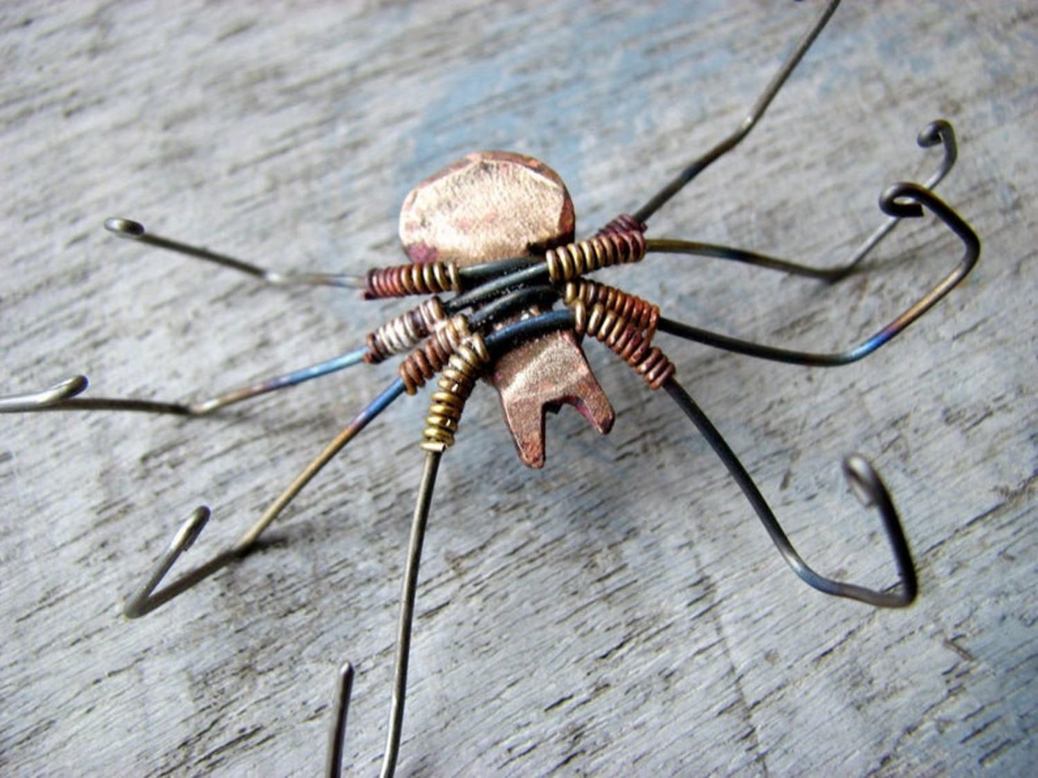 Giant Spider Earrings - Dangling spider earrings with spider leg through ear hole