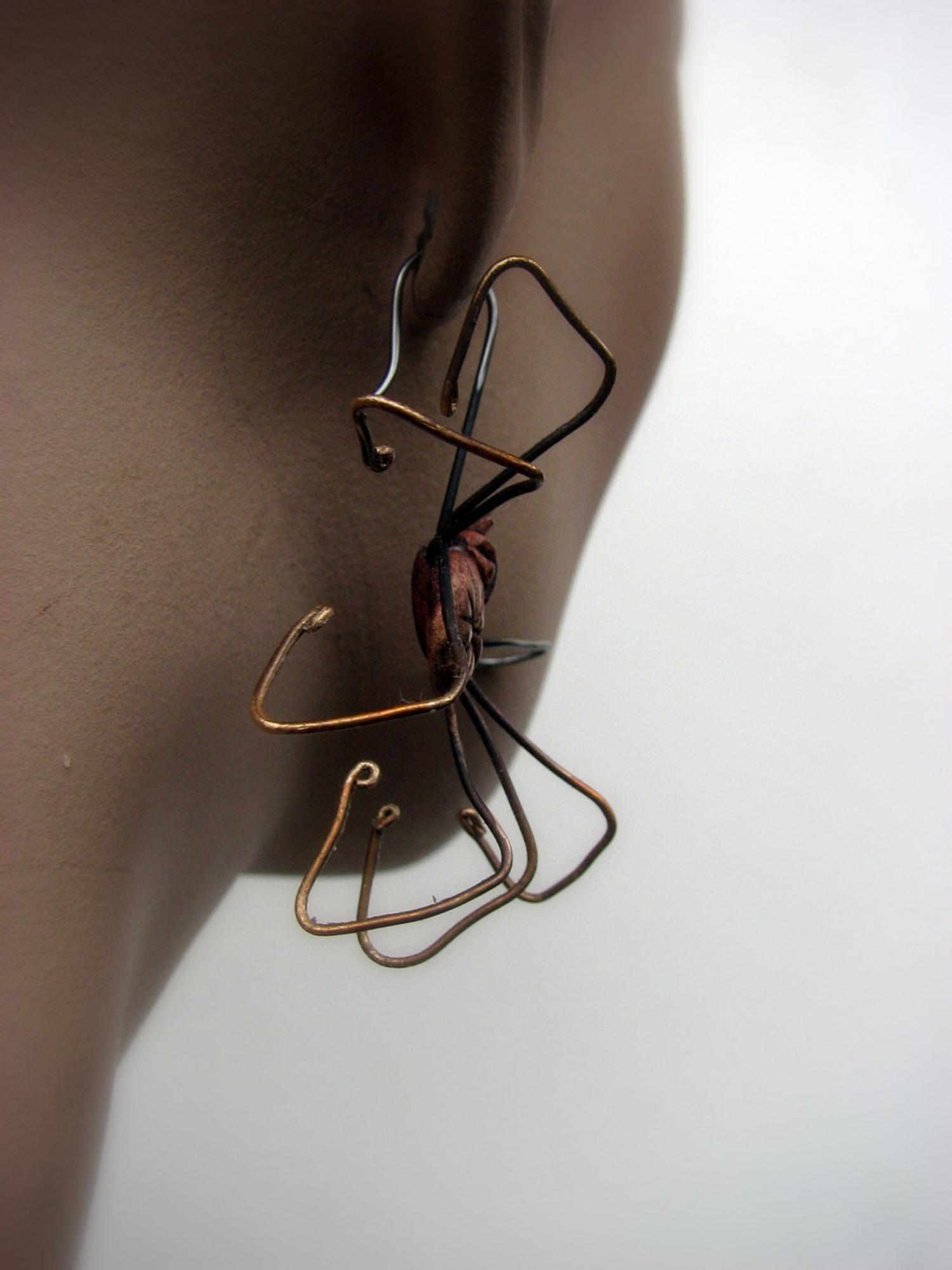 Giant Spider Earrings - Dangling spider earrings with spider leg through ear hole