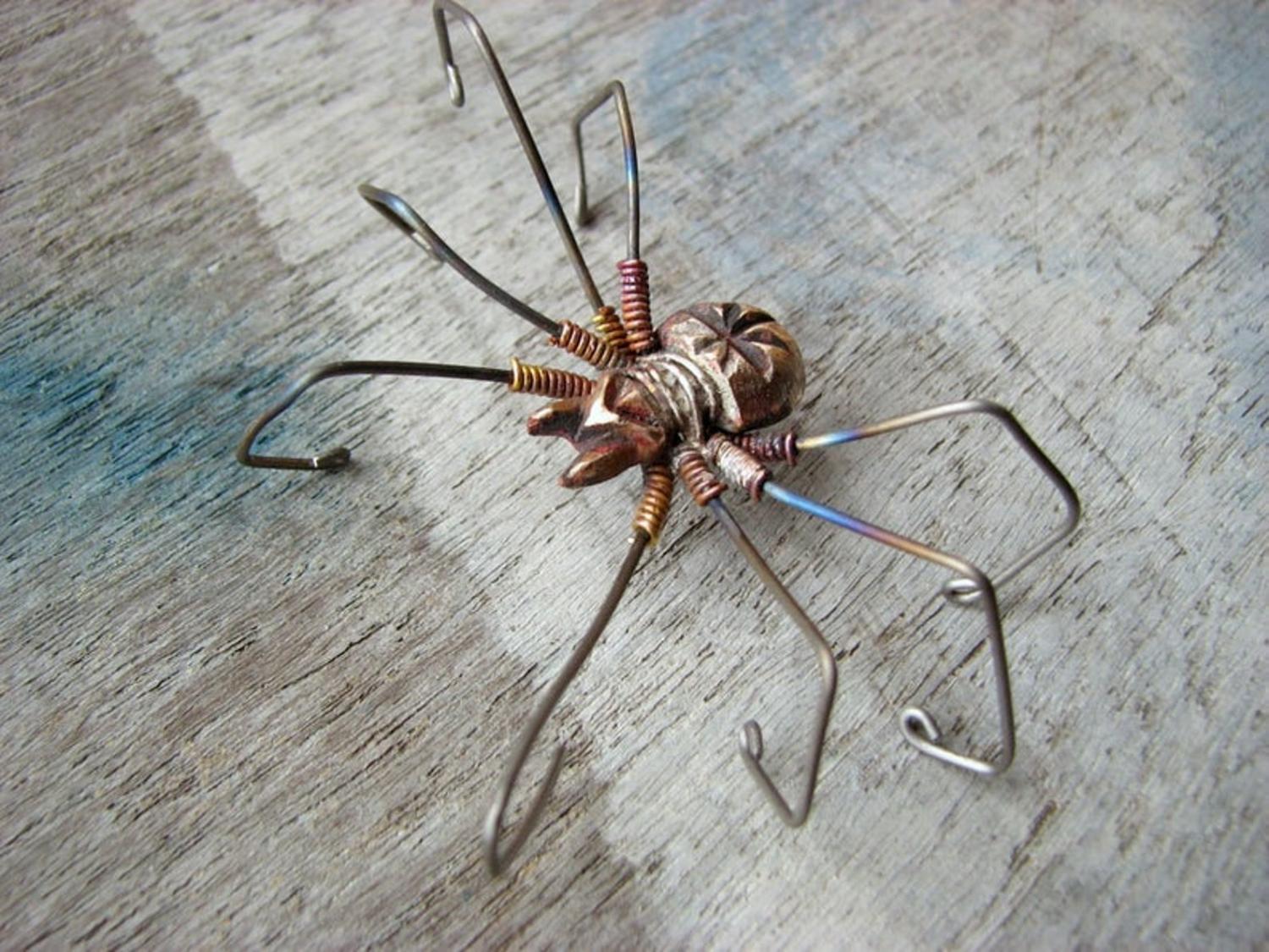 Giant Spider Earrings - Dangling spider earrings with spider leg through ear hole