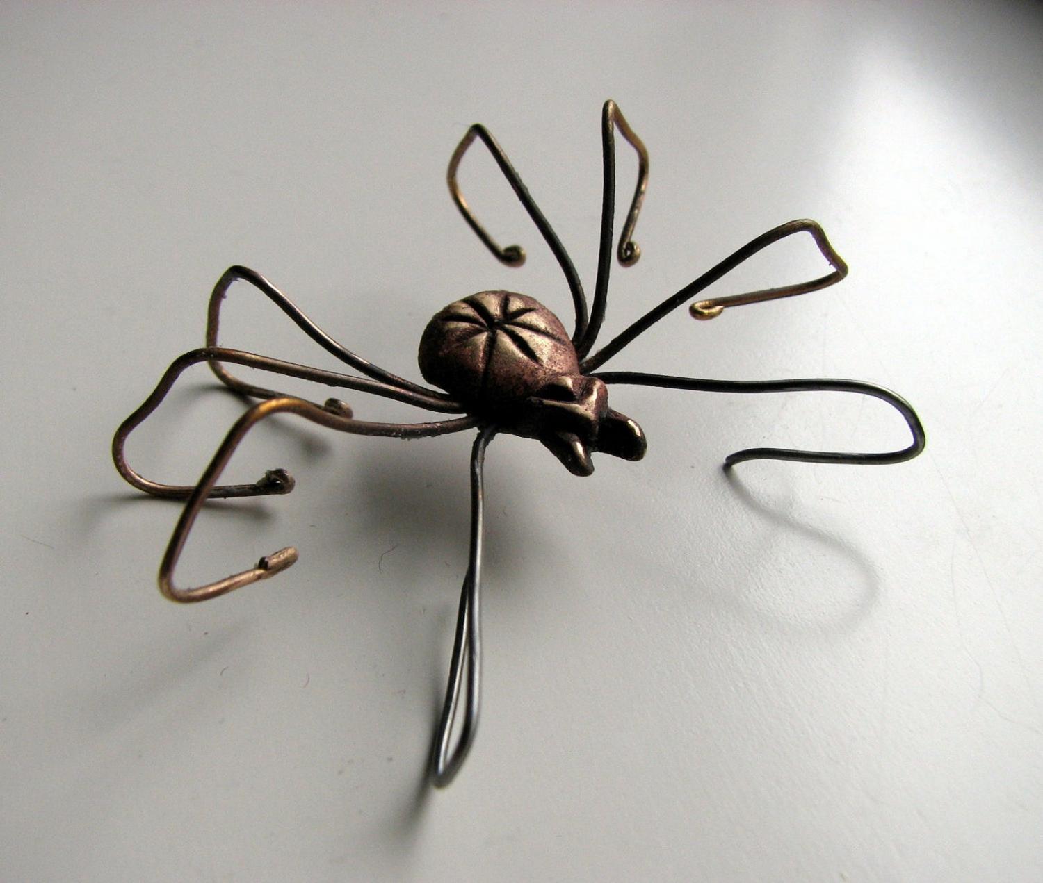 Giant Spider Earrings - Dangling spider earrings with spider leg through ear hole