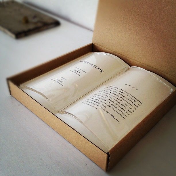 Book on Book Glass Page Holder - Transparent acrylic book shaped glass holds pages of books open