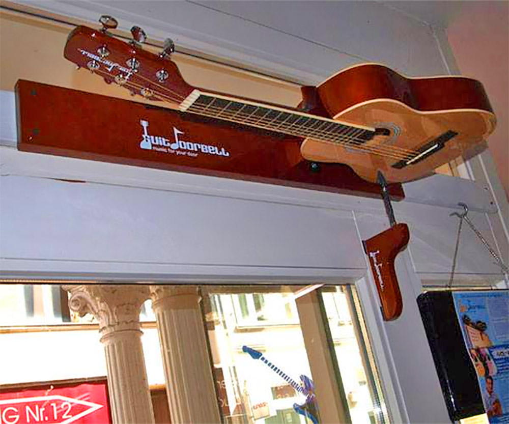 Guitar Doorbell - Guitar Door chime strums guitar each time door is opened