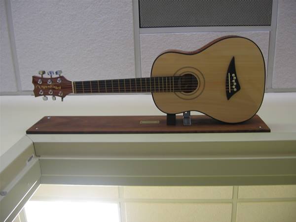 Guitar Doorbell - Guitar Door chime strums guitar each time door is opened