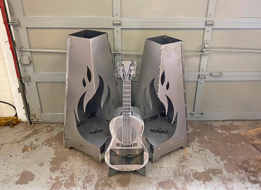 Guitar Fire Pit - Metal guitar shaped wood burning stove