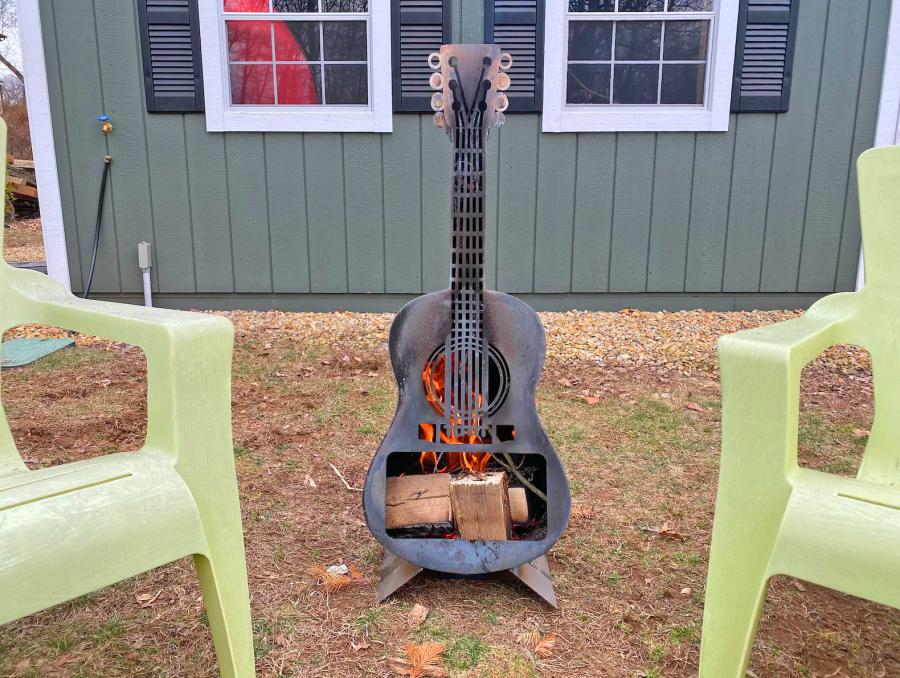 Guitar Fire Pit - Metal guitar shaped wood burning stove