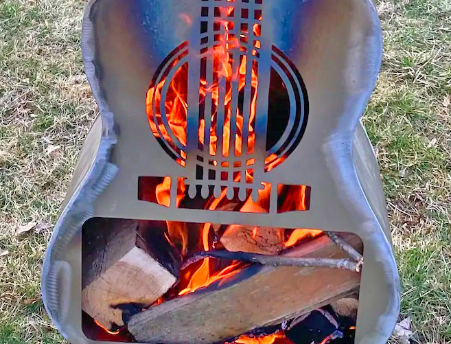 Guitar Fire Pit - Metal guitar shaped wood burning stove