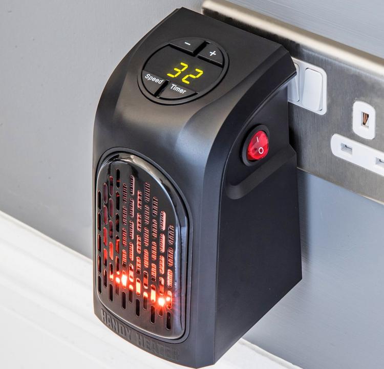 Handy Heater - Mini portable heater attaches to any outlet - Mini outlet space heater
