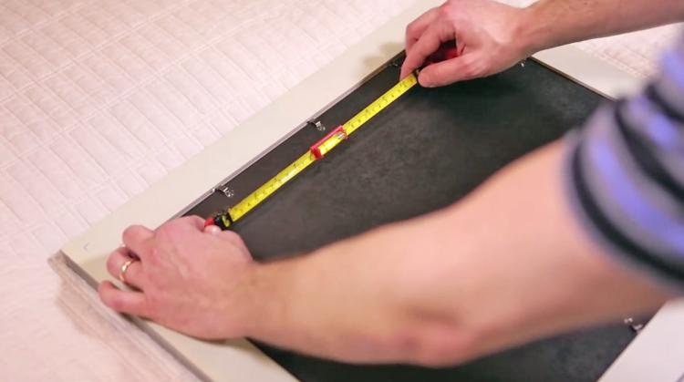 Hang-o-matic: All-in-one Picture Hanging Tool - Picture hanging tools built into tape measure