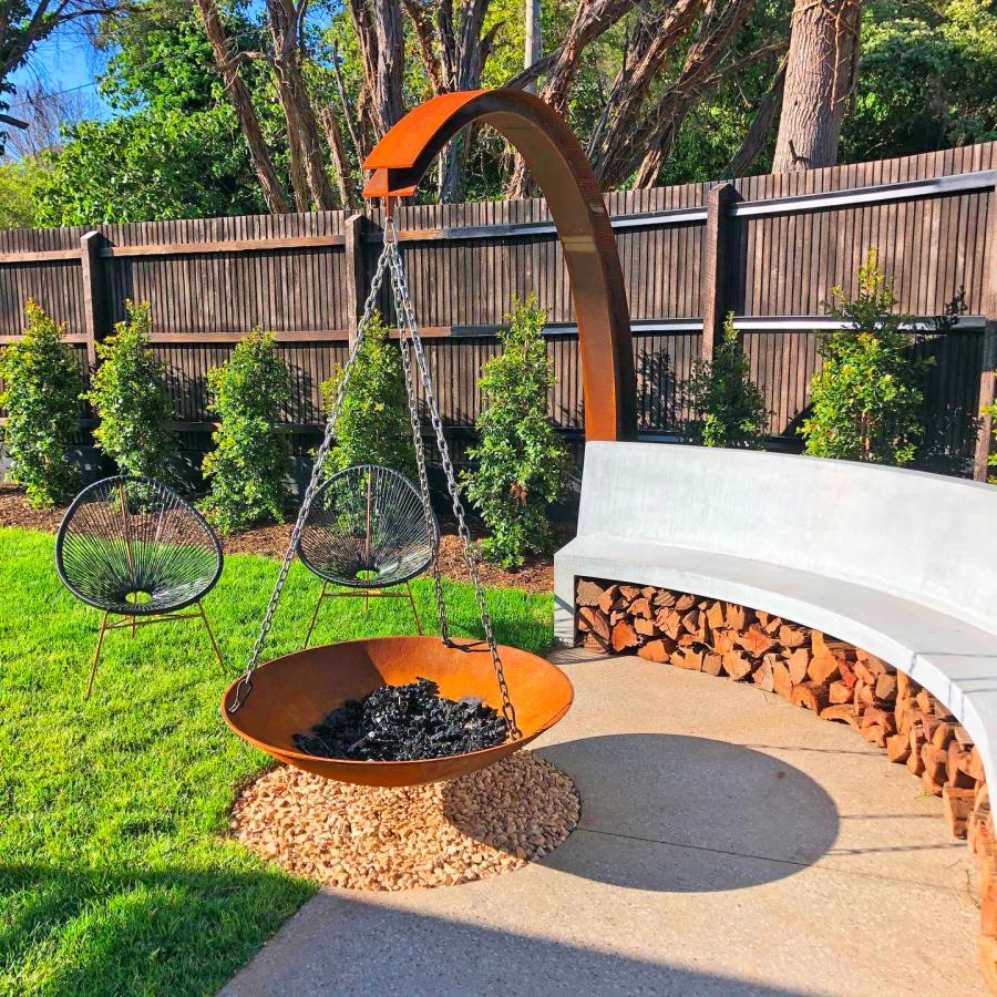 Hanging Fire Pit With Giant Arching Metal Support Beam By Matt Hill