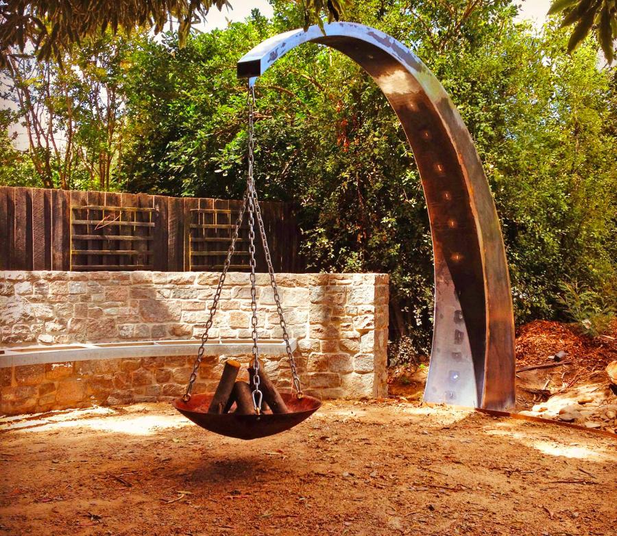 Hanging Fire Pit With Giant Arching Metal Support Beam By Matt Hill