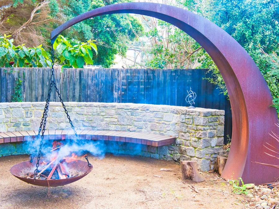 Hanging Fire Pit With Giant Arching Metal Support Beam By Matt Hill
