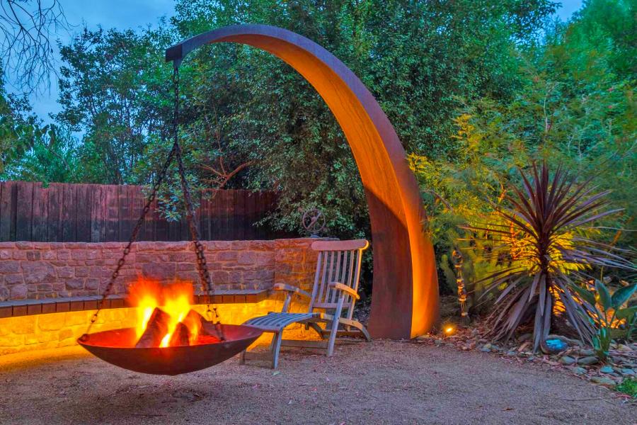 Hanging Fire Pit With Giant Arching Metal Support Beam By Matt Hill