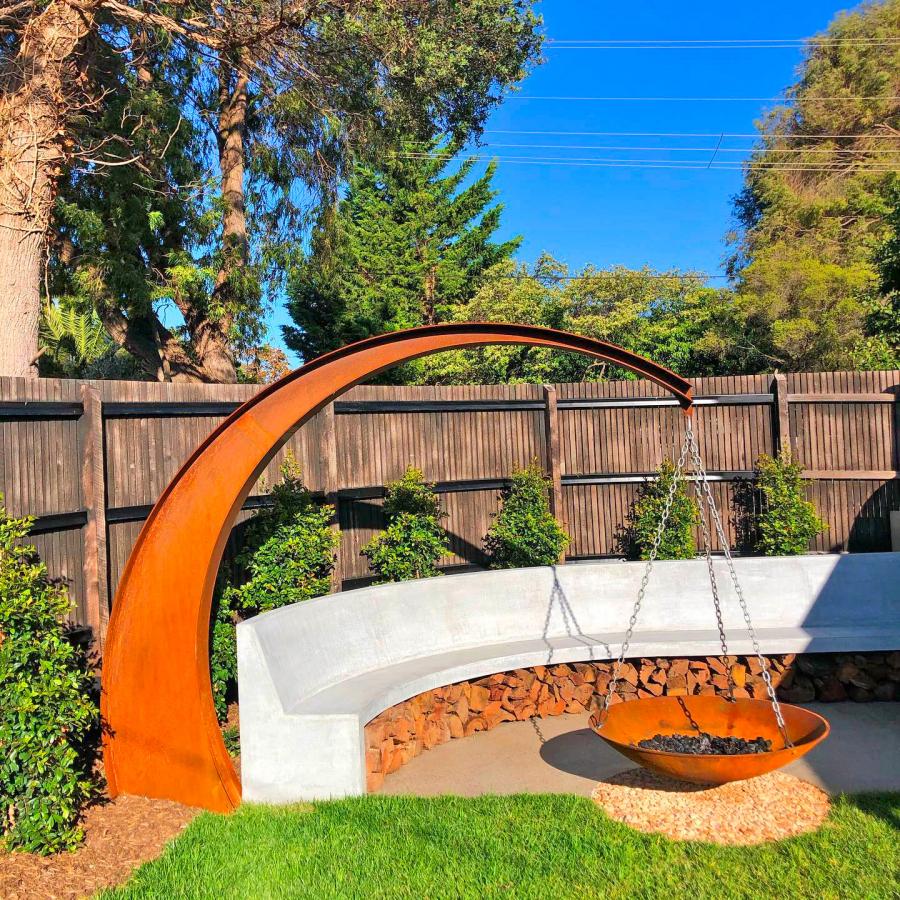 Hanging Fire Pit With Giant Arching Metal Support Beam By Matt Hill