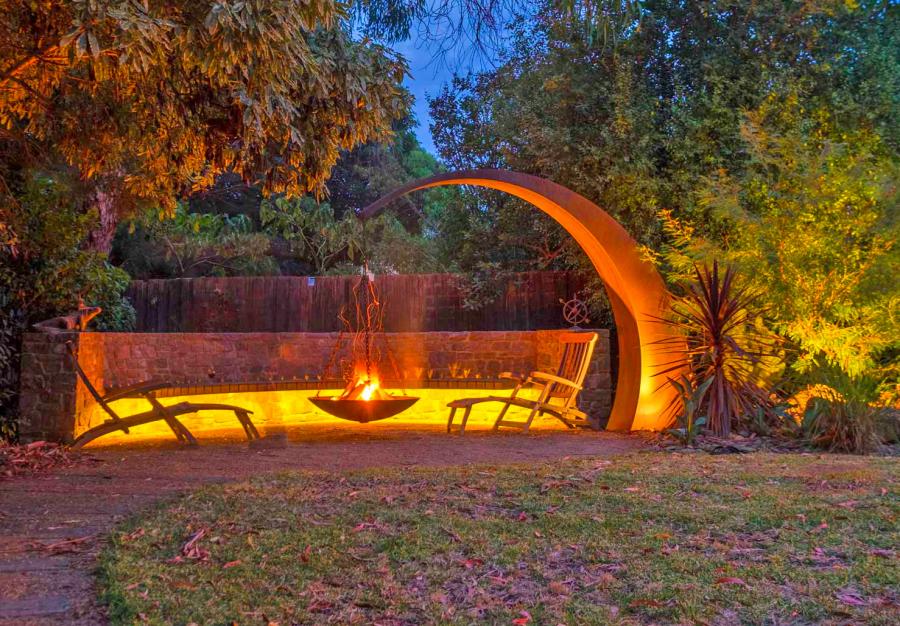 Hanging Fire Pit With Giant Arching Metal Support Beam By Matt Hill