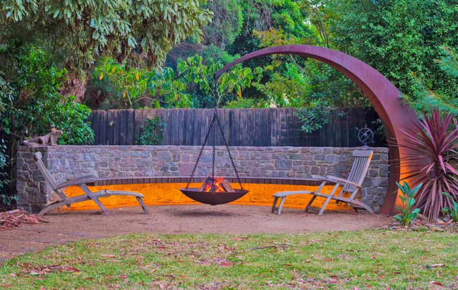 Hanging Fire Pit With Giant Arching Metal Support Beam By Matt Hill