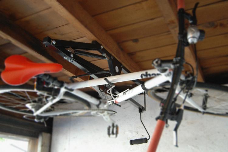 Hide-a-Ride Bicycling Ceiling Mount - Mount your bike on your ceiling sideways to save space in home
