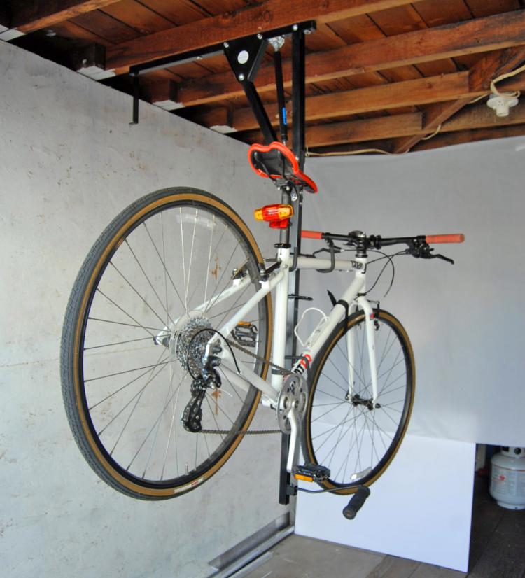 Hide-a-Ride Bicycling Ceiling Mount - Mount your bike on your ceiling sideways to save space in home