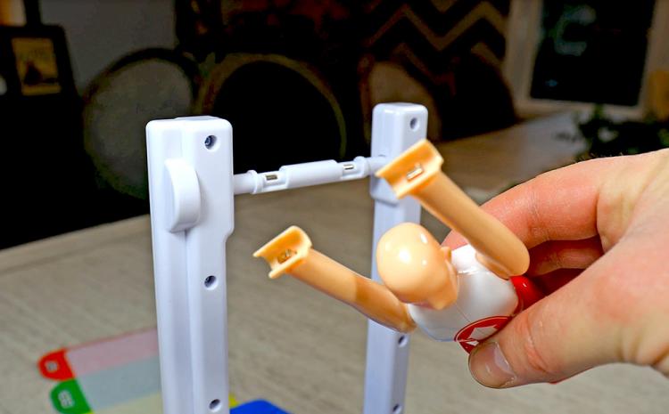 Spinning Gymnastics Toy - Spin gymnast around bar and land on velcro mat