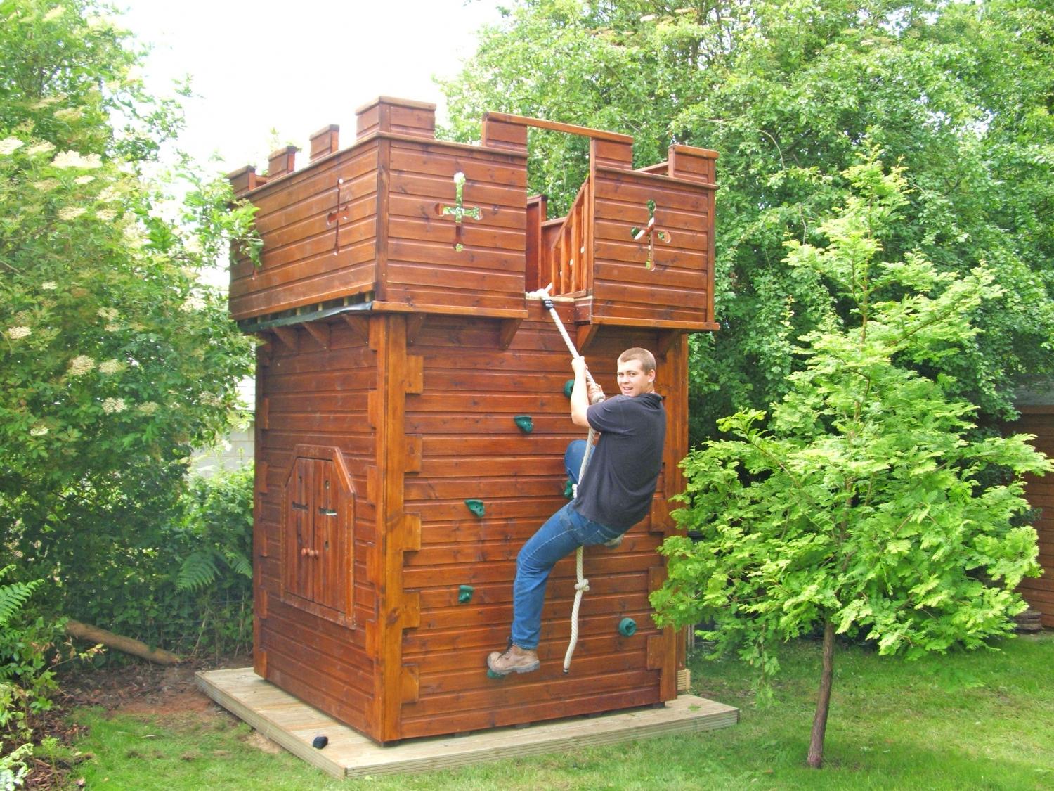Custom Castle Shaped Kids Playhouse with climbing wall