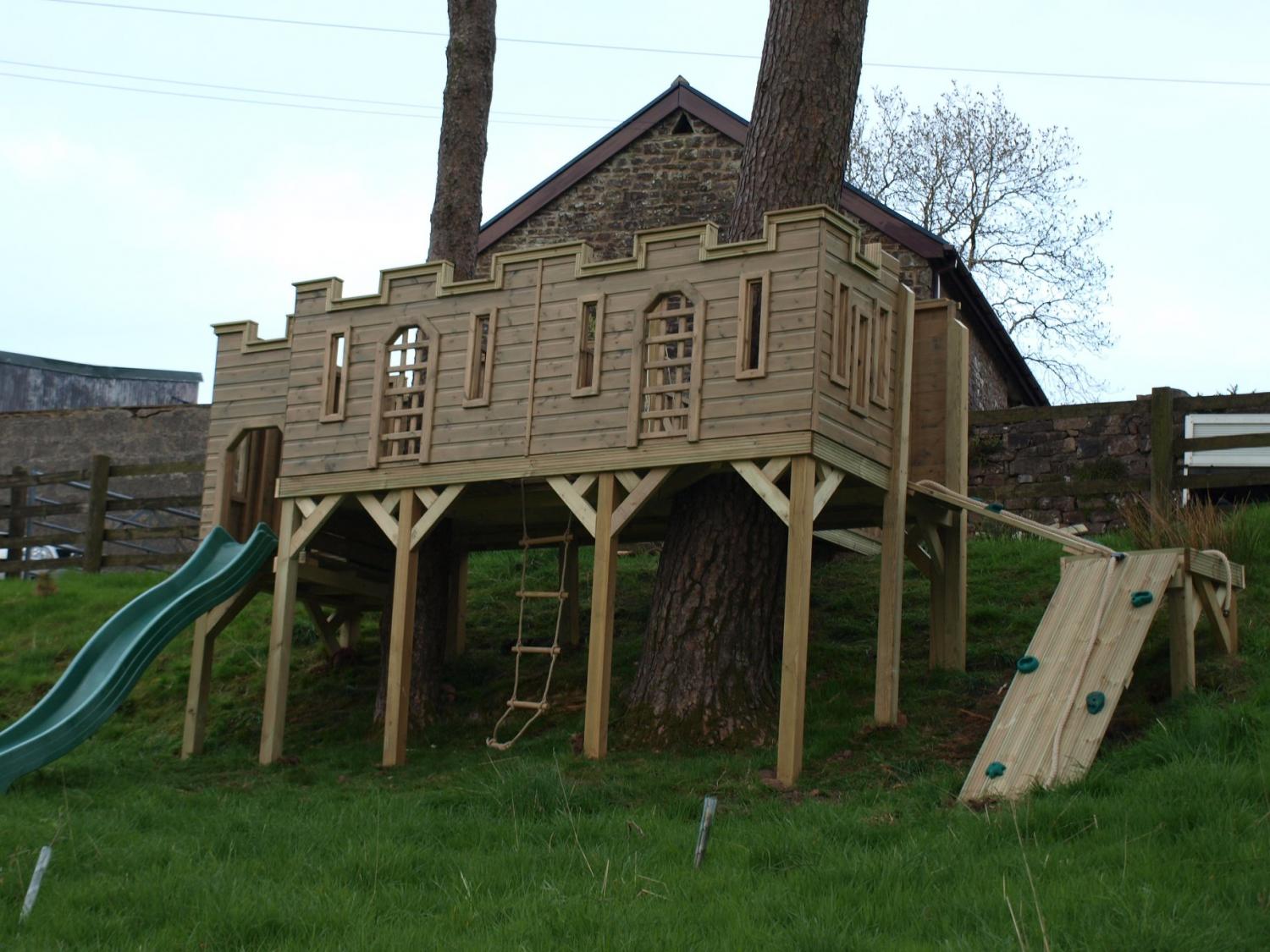 Custom Castle Shaped Kids Playhouse with climbing wall