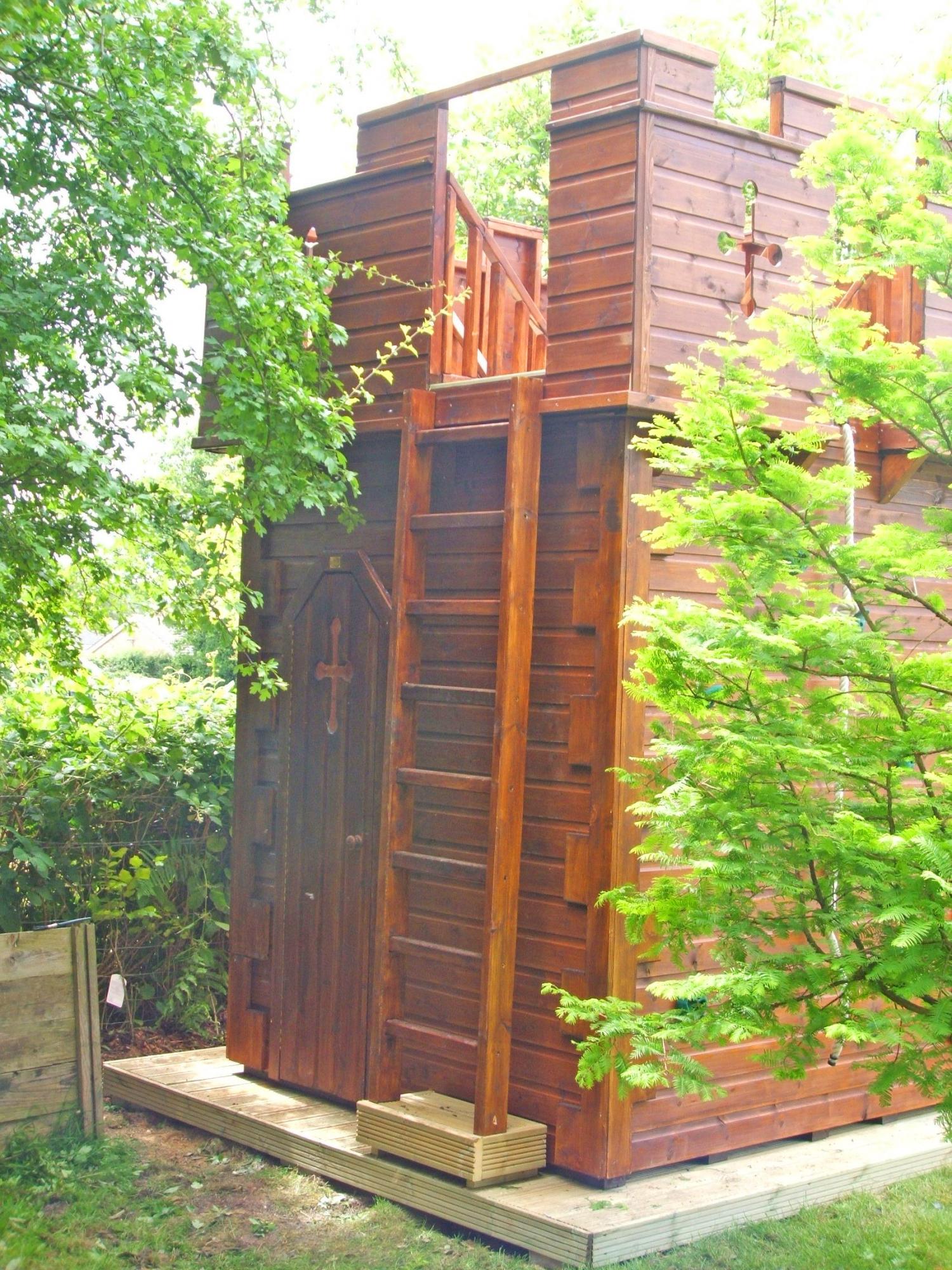 Custom Castle Shaped Kids Playhouse with climbing wall