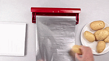 Kuhn Rikon Fast Wrap - Easy plastic wrap container and cutter - tinfoil and plastic wrap holder