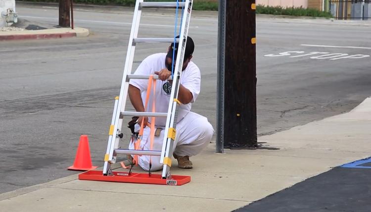 Ladder Lockdown Secures Ladder In Place on any Surface or Terrain