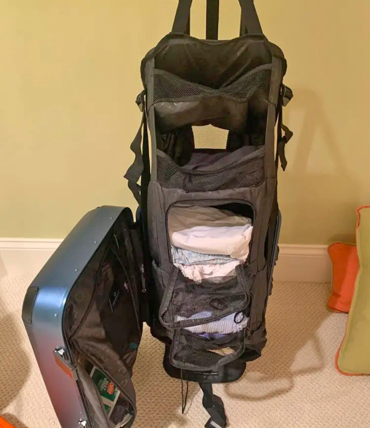 Luggage with a built-in closet - suitcase pull up shelf closet