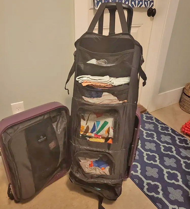 Luggage with a built-in closet - suitcase pull up shelf closet