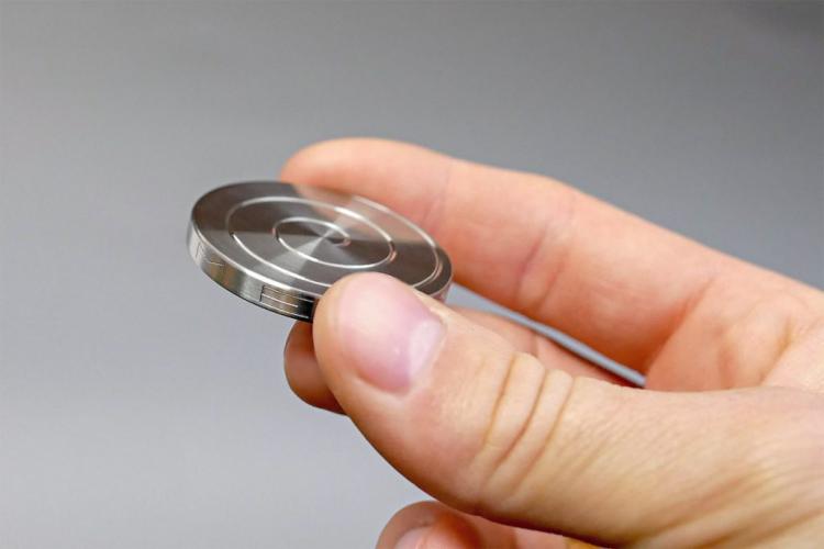MezmoCoin Is an Mesmerizing Spinning Top That Spins For Over 12 Minutes - Incredible long lasting spinning coin fidget toy