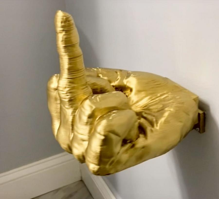 golden middle finger toilet paper