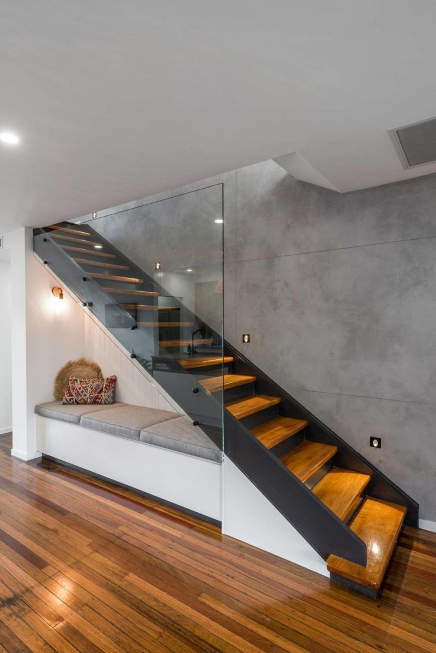 Most Creative Under The Stairs Home Designs - Modern lounge couch under the stairs