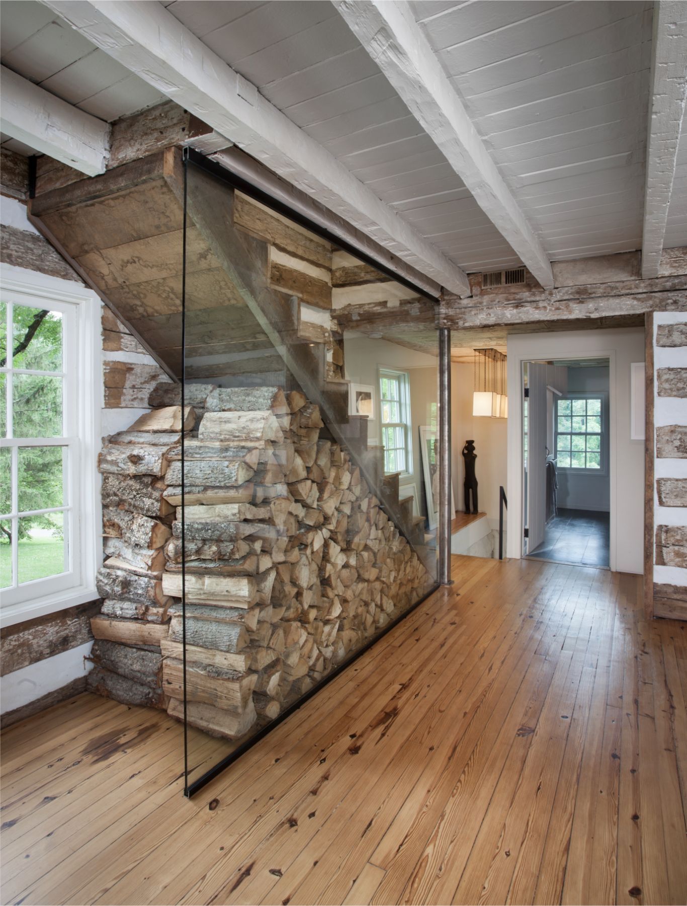 Most Creative Under The Stairs Home Designs - Firewood storage under the stairs