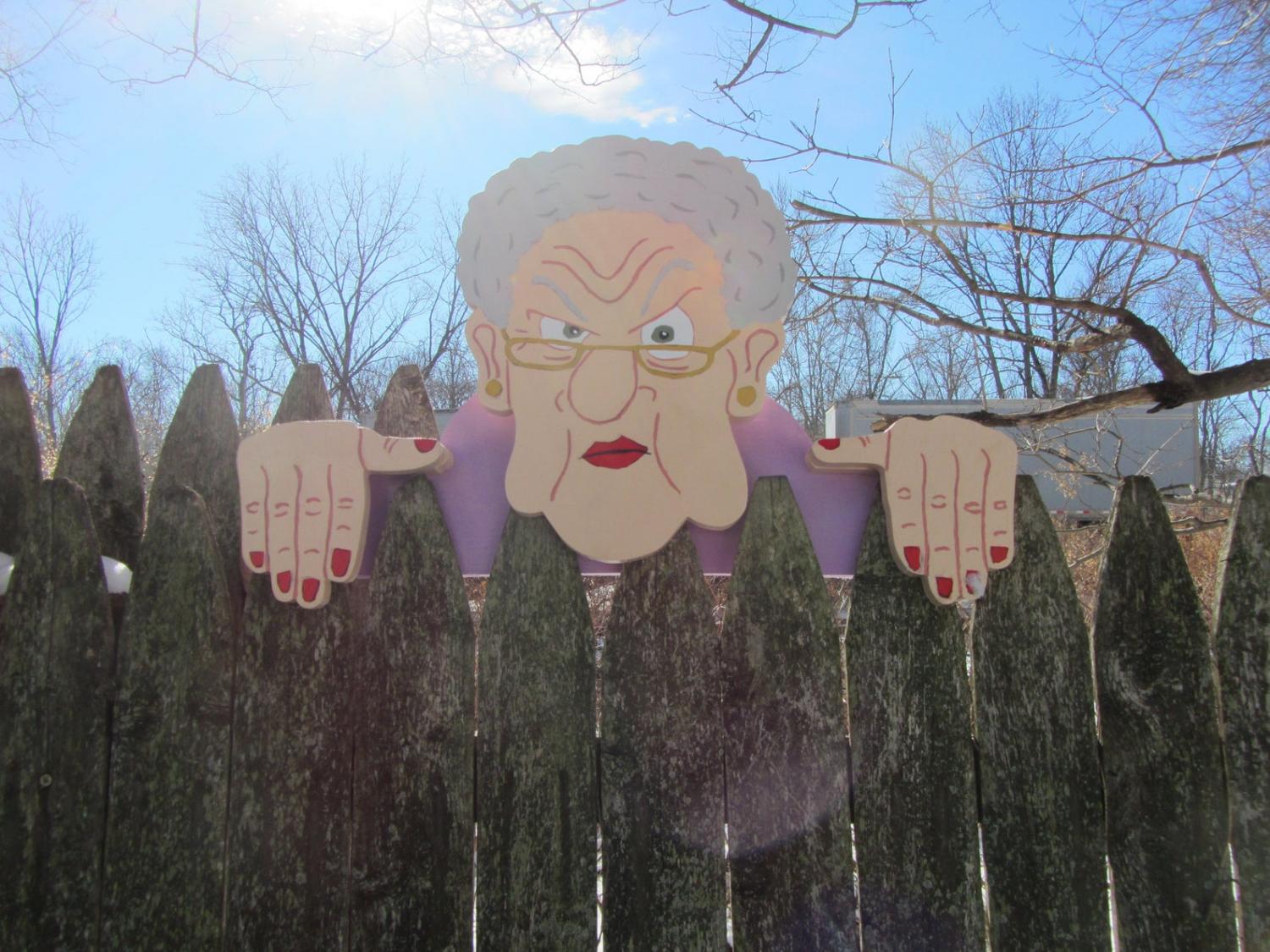 grumpy elderly lady fence sitter grumpy elderly lady fence sitter