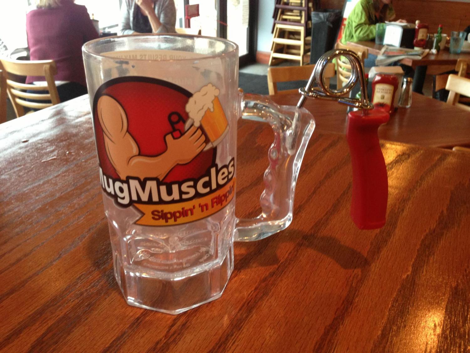 Mug Muscle Workout Mug With Hand Exercise Tool On It