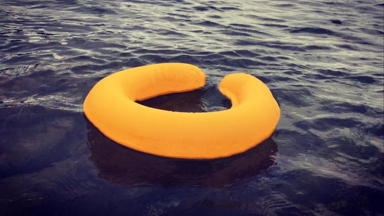 OneUp Throwable life-preserver flotation device - Instant inflating life-saving device