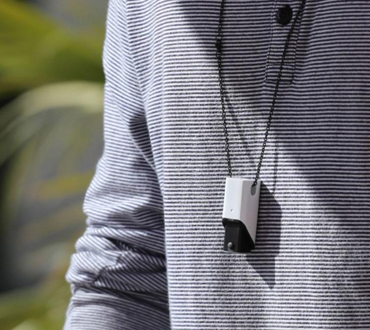 OPKIX ONE Tiny Wearable Action Camera Attaches Sunglasses - Tiny camera charging egg