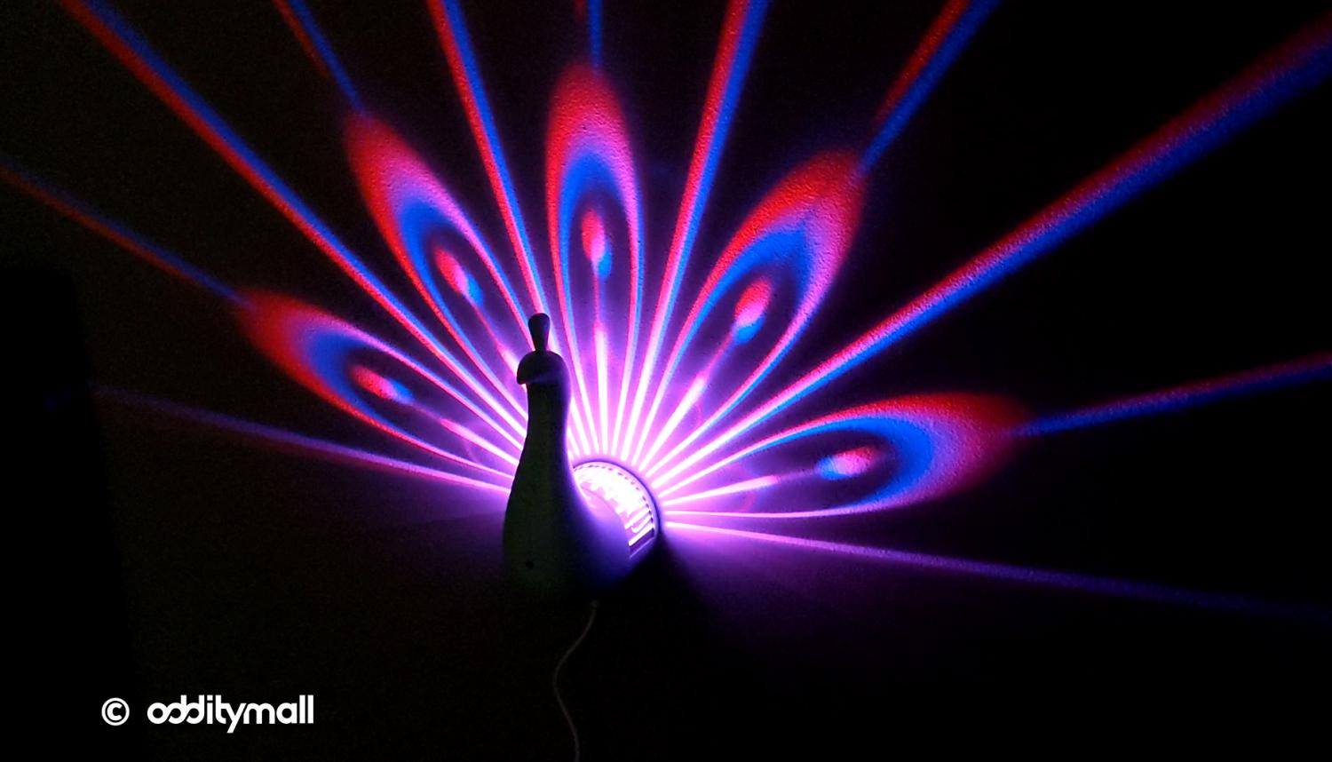 LED Peacock Night-Light Projects Its Colorful Plumage Onto Your Wall