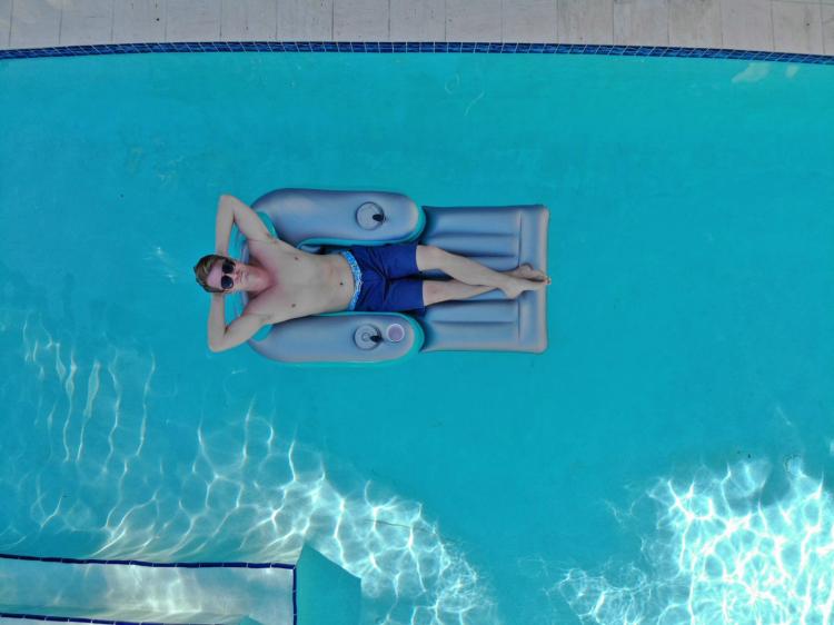 Pool Candy Motorized Pool Lounger - Dual motor inflatable pool floaty with joysticks