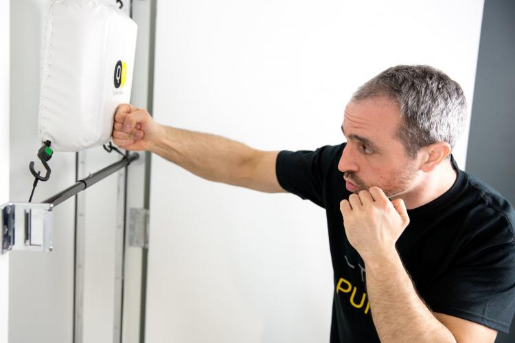 Quiet Punch: Punching Bag That Attaches To Any Door-Frame