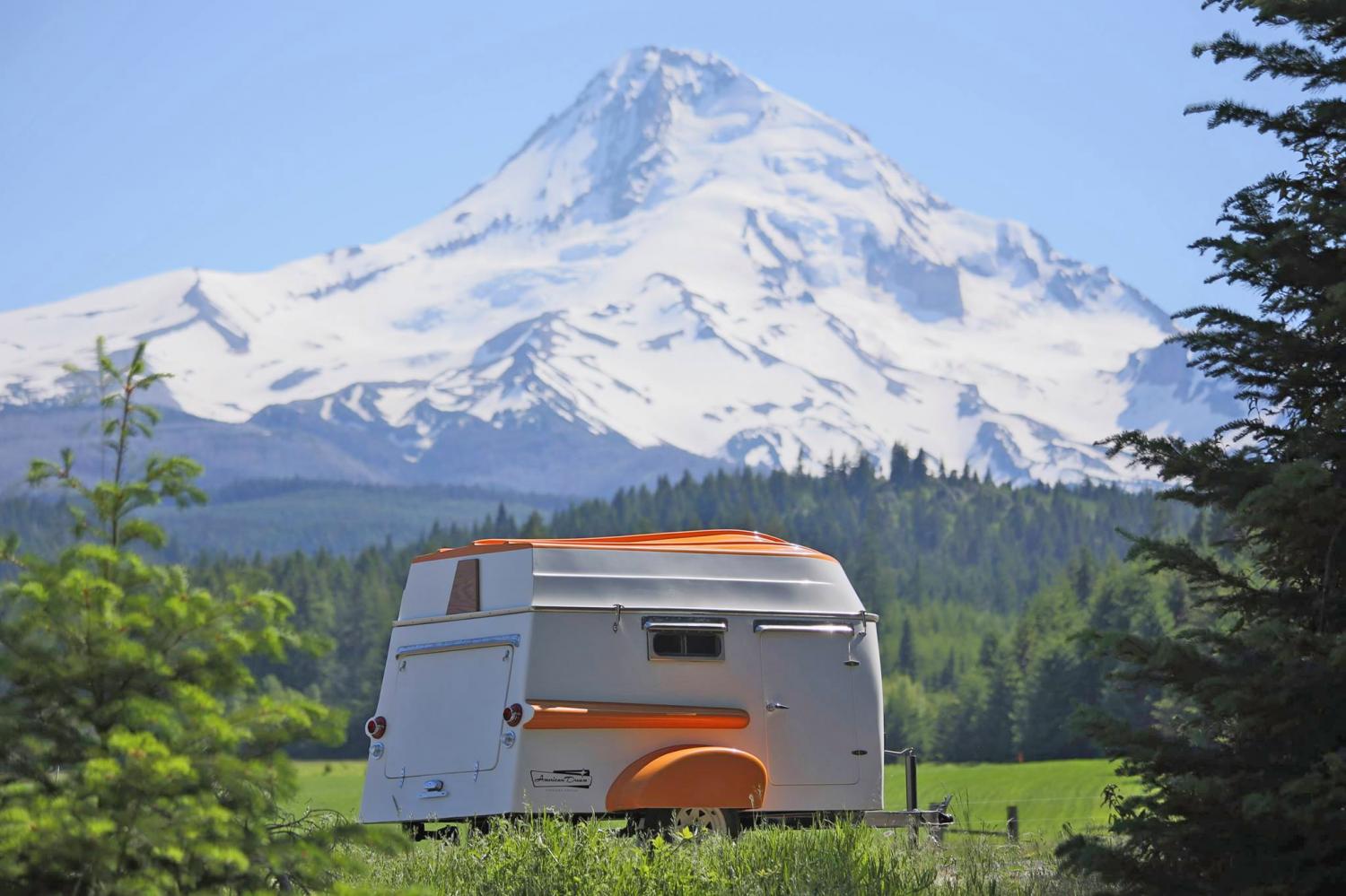 Retro Camper Boat - 1950's Teardrop trailer with row boat as roof of camper
