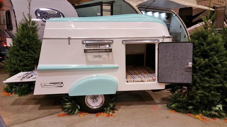 Retro Camper Boat - 1950's Teardrop trailer with row boat as roof of camper