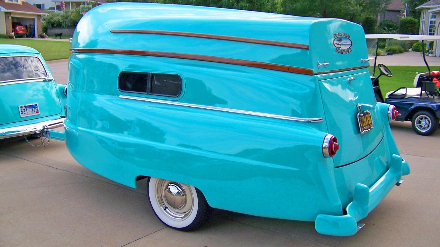 Retro Camper Boat - 1950's Teardrop trailer with row boat as roof of camper