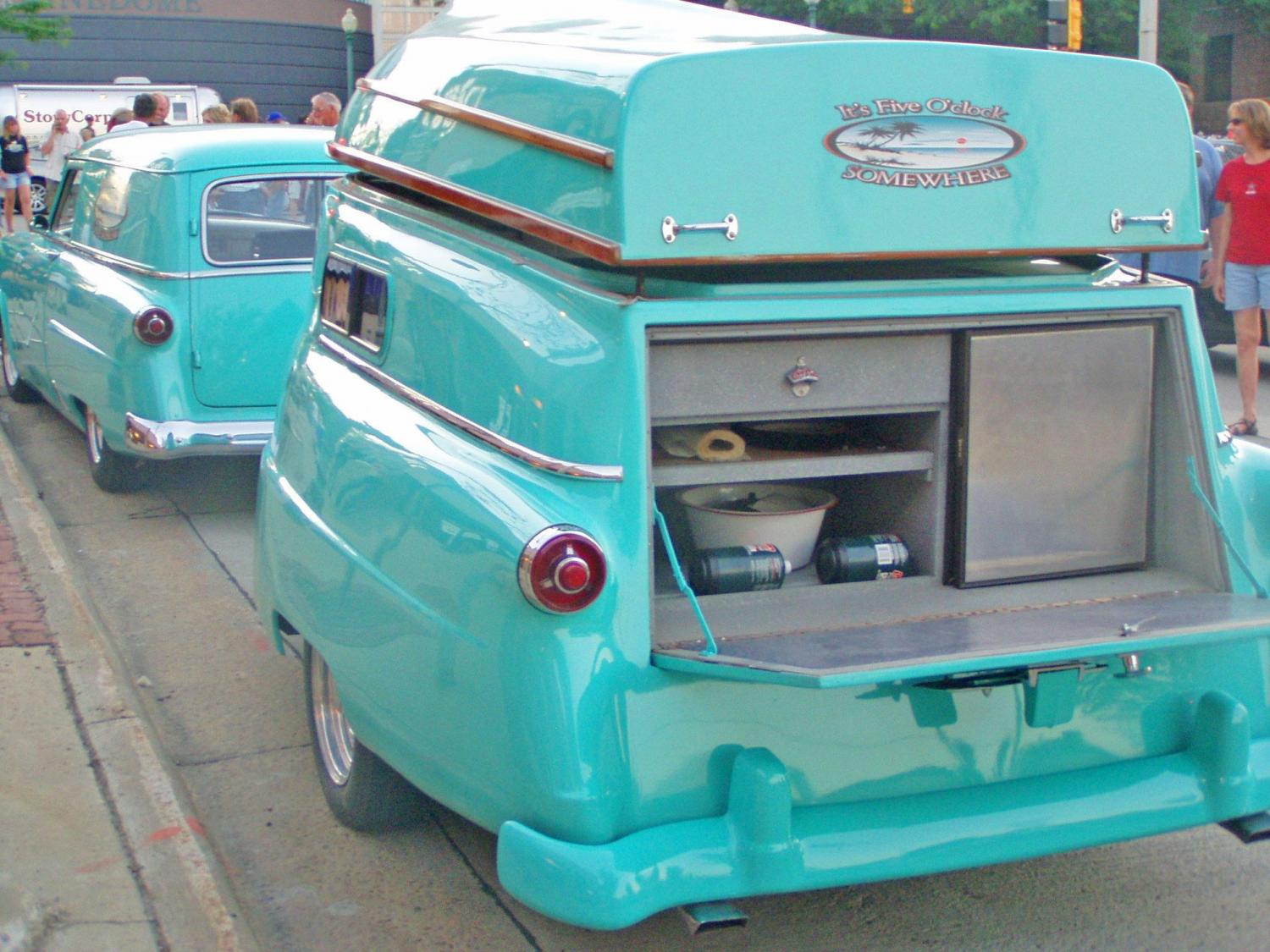 Retro Camper Boat - 1950's Teardrop trailer with row boat as roof of camper
