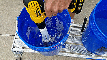 Roller Ready Paint Roller Cleaner cleans dirty paint rollers in seconds using a cordless drill - Drill bit paint roller cleaner