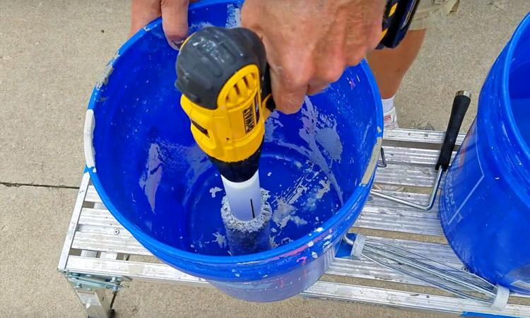 Roller Ready Paint Roller Cleaner cleans dirty paint rollers in seconds using a cordless drill - Drill bit paint roller cleaner
