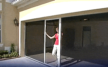 Rolling Mosquito Screen Attaches To Your Garage Door Track - Lifestyle screens garage door bug screen with sliding door