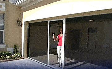 Rolling Mosquito Screen Attaches To Your Garage Door Track - Lifestyle screens garage door bug screen with sliding door